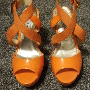 NWOT orange wedge heels